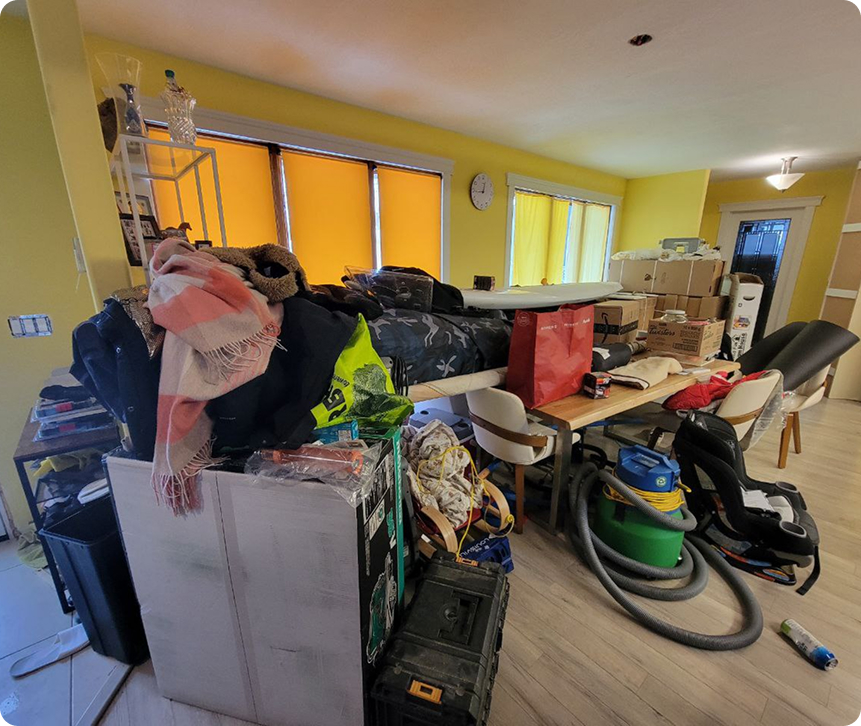 Before - cluttered room with junk